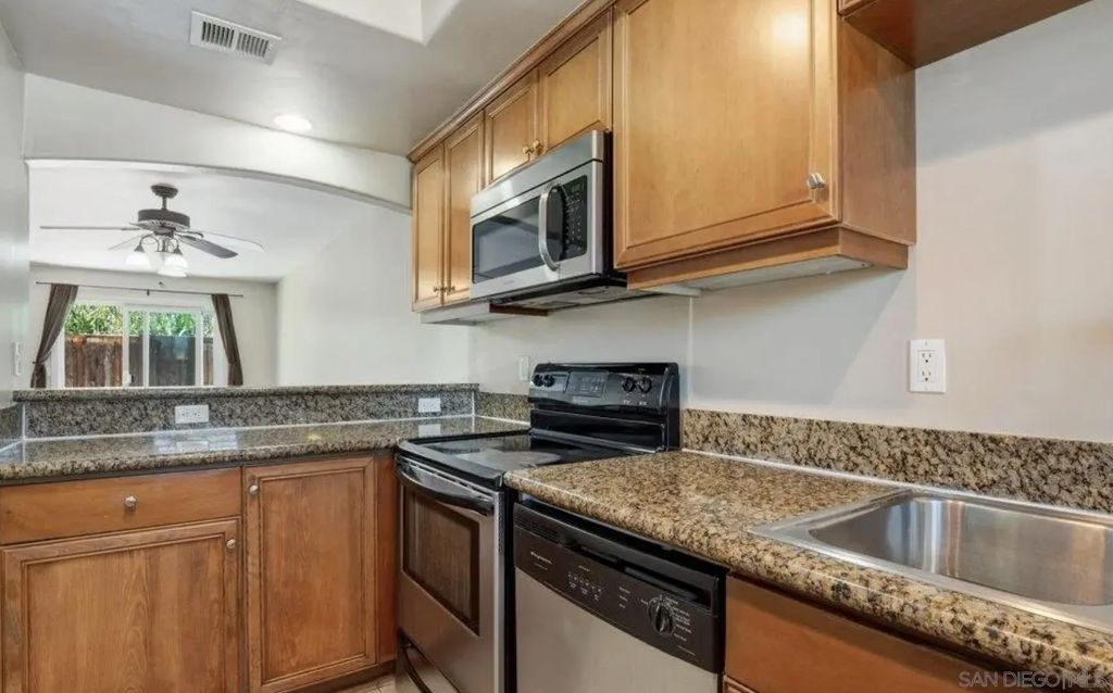 Photo of 910 S Magnolia Ave #H, El Cajon, CA 92020 (MLS # 250043837)