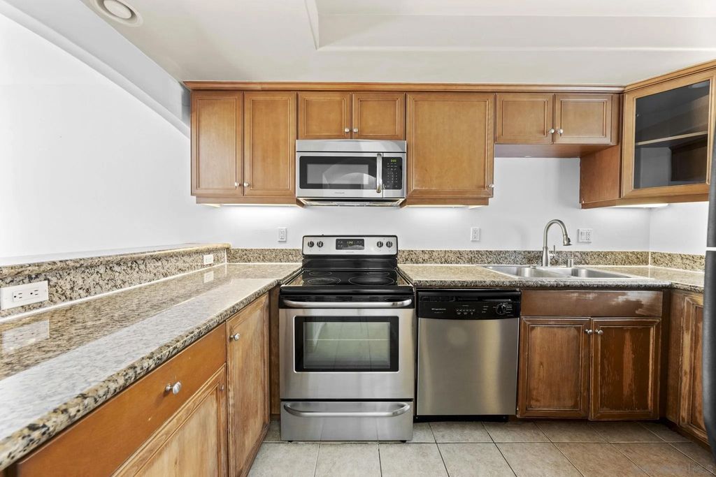 Photo of 910 S Magnolia Ave #H, El Cajon, CA 92020 (MLS # 250043837)