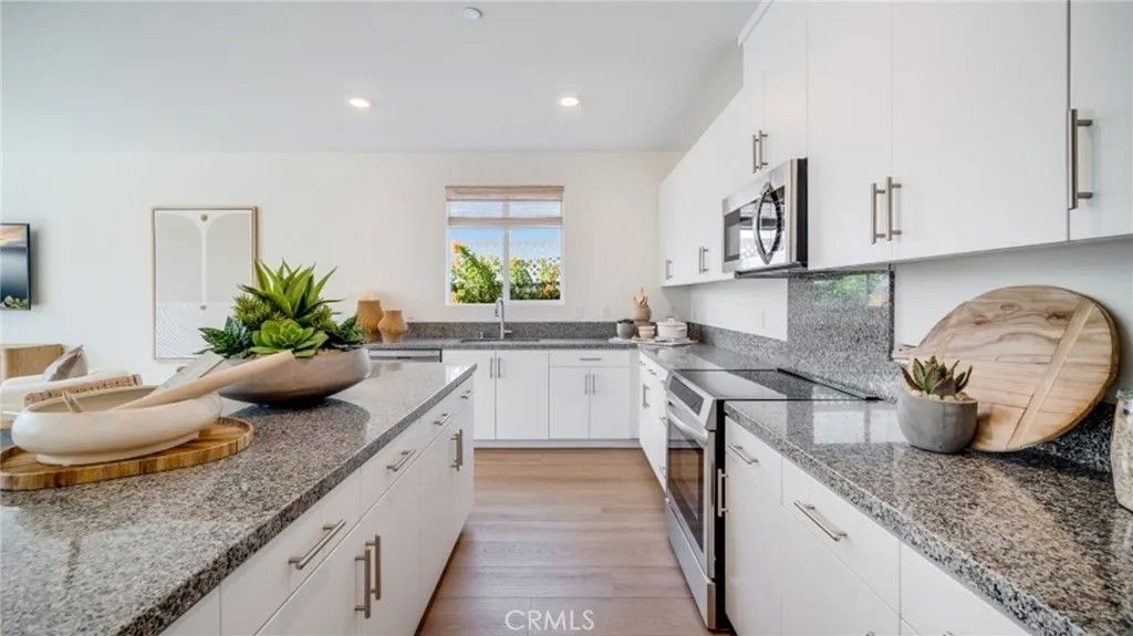 Photo of 2374 Lionheart Drive, Perris, CA 92570 (MLS # SW26010459)