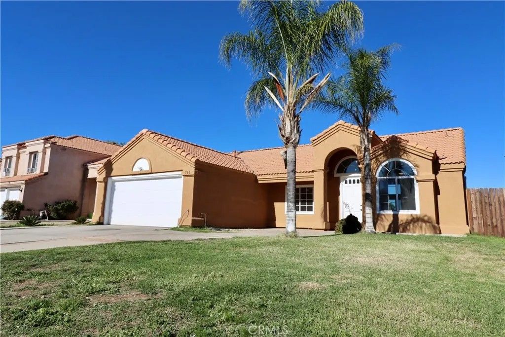 Photo of 716 Periwinkle Ln, Perris, CA 92571 (MLS # DW25275292)