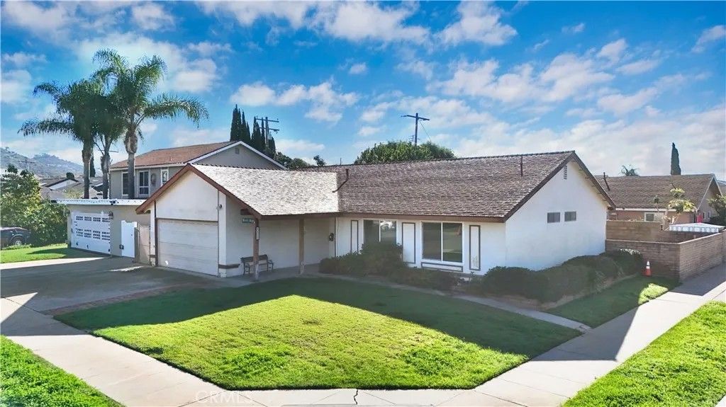 Photo of 4422 E Silverleaf Avenue, Orange, CA 92869 (MLS # PW26004522)