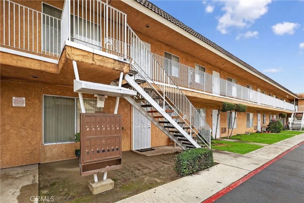 Photo of 16205 Cornuta Ave #5, Bellflower, CA 90706 (MLS # OC26078333)