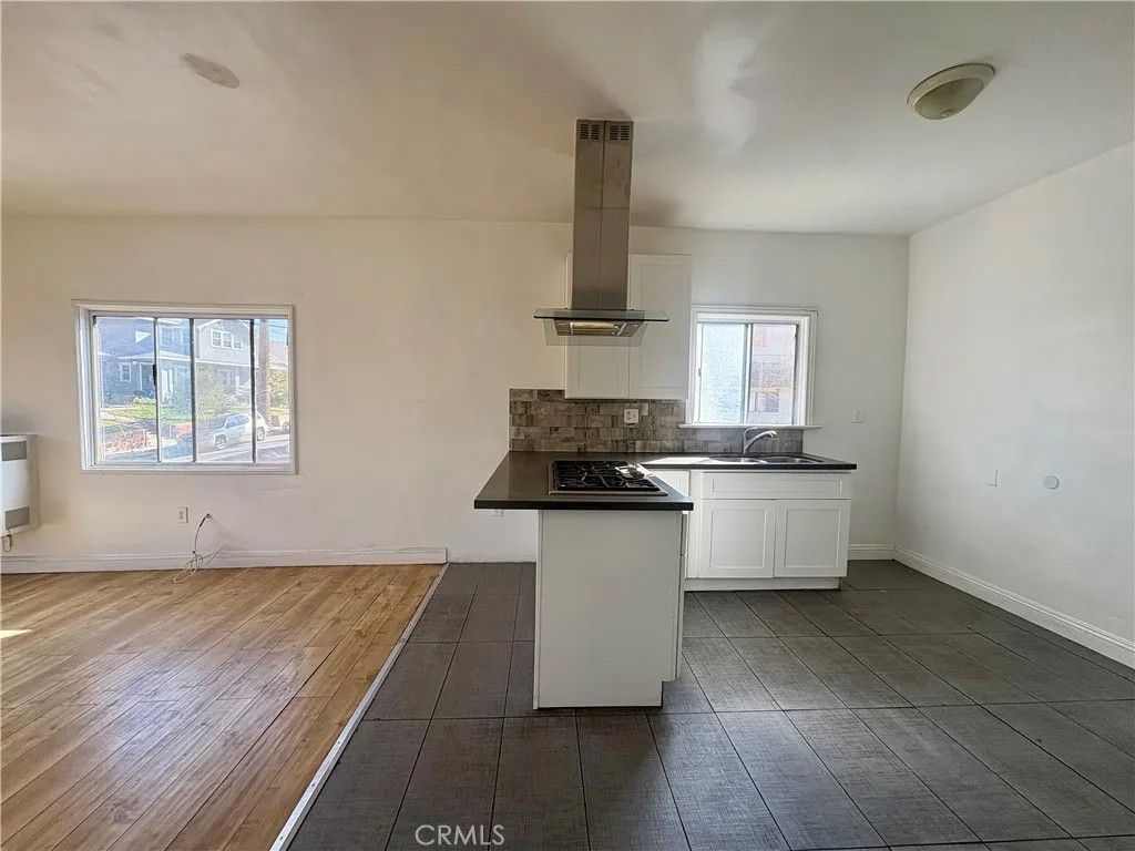 Photo of 705 S St Louis St, Los Angeles, CA 90023 (MLS # DW25247071)
