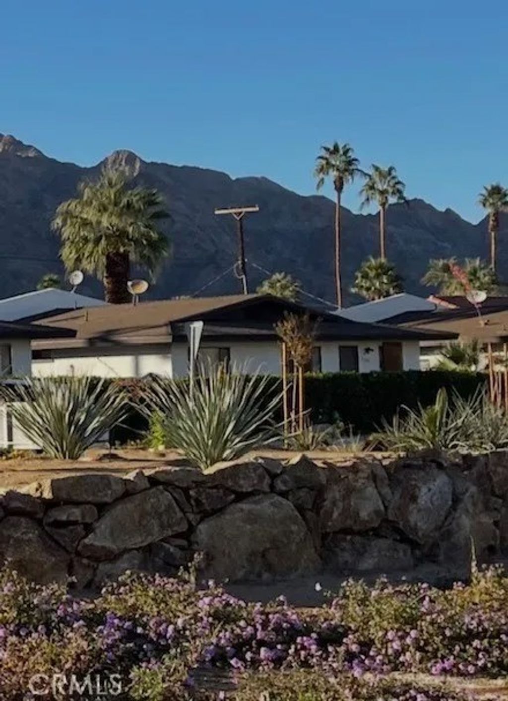 Photo of 51225 Eisenhower Drive #B, La Quinta, CA 92253 (MLS # OC26049837)