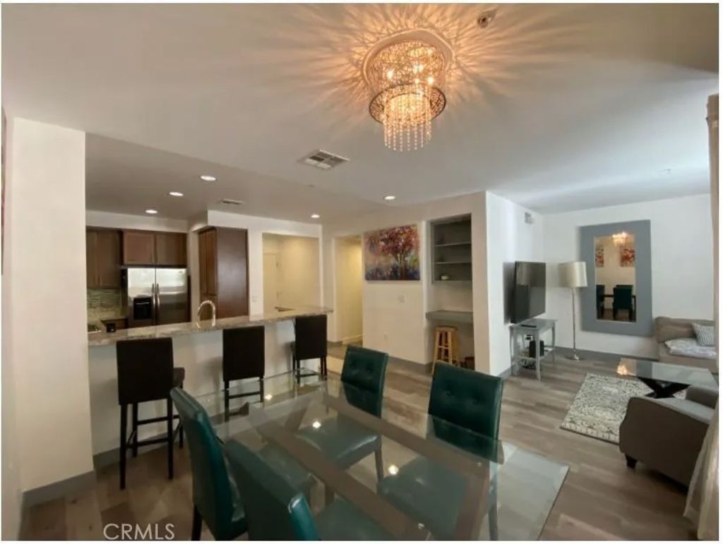 Photo of 21301 Erwin St, Woodland Hills, CA 91367 (MLS # SR26068930)