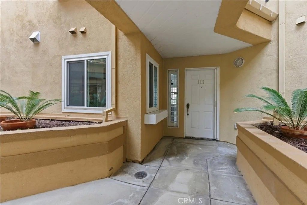 Photo of 16291 Countess Dr #115, Huntington Beach, CA 92649 (MLS # OC26036202)