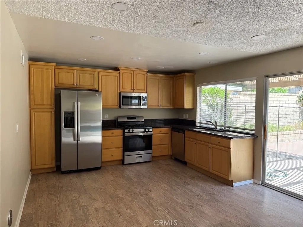 Photo of 29338 Florabunda Rd, Canyon Country, CA 91387 (MLS # OC26069526)