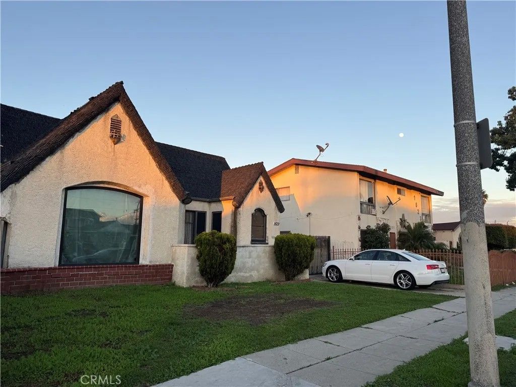 Photo of 1629 W 80th St, Los Angeles, CA 90047 (MLS # DW26001174)