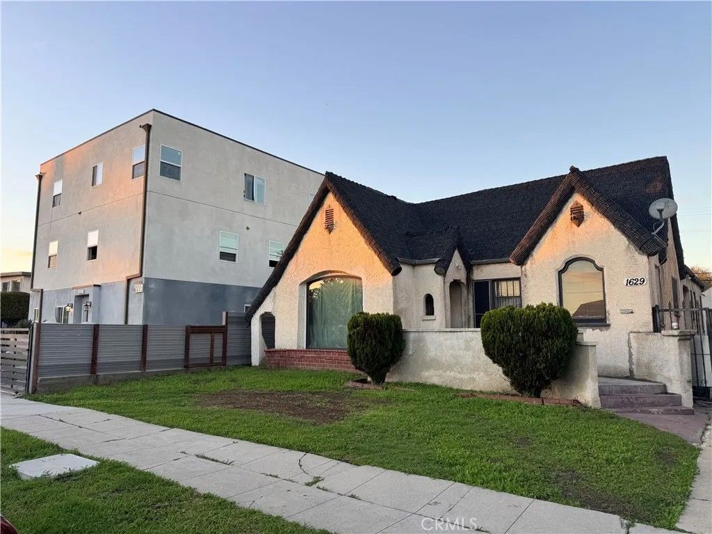 Photo of 1629 W 80th St, Los Angeles, CA 90047 (MLS # DW26001174)