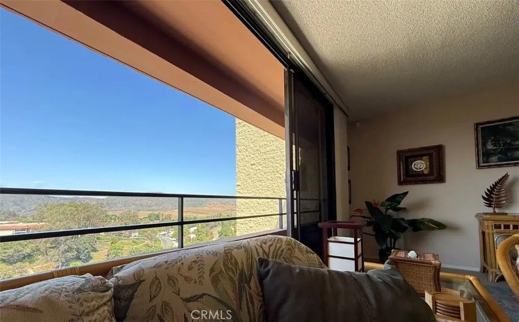 Photo of 24055 Paseo Del Lago #1259, Laguna Woods, CA 92637 (MLS # OC25276656)