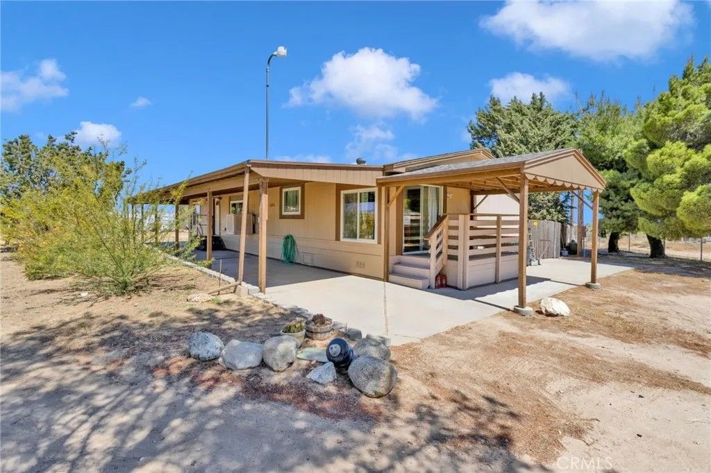 Photo of 10532 Acanthus Street, Phelan, CA 92371 (MLS # HD26094644)