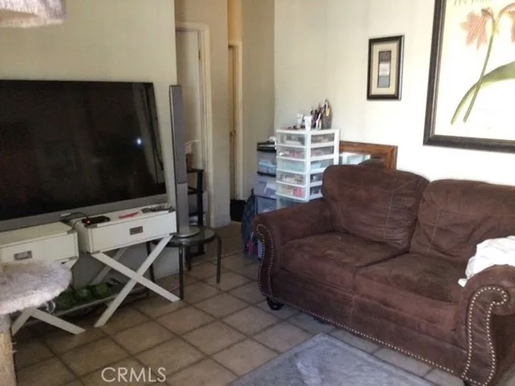 Photo of 7560 Woodman Pl #74, Van Nuys, CA 91405 (MLS # SR26014235)