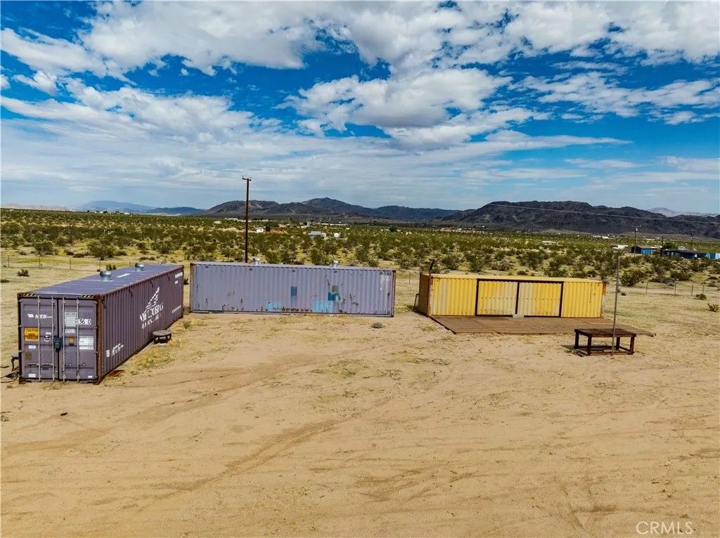 Photo of 4185 Kickapoo Trl, Landers, CA 92285 (MLS # JT25237075)
