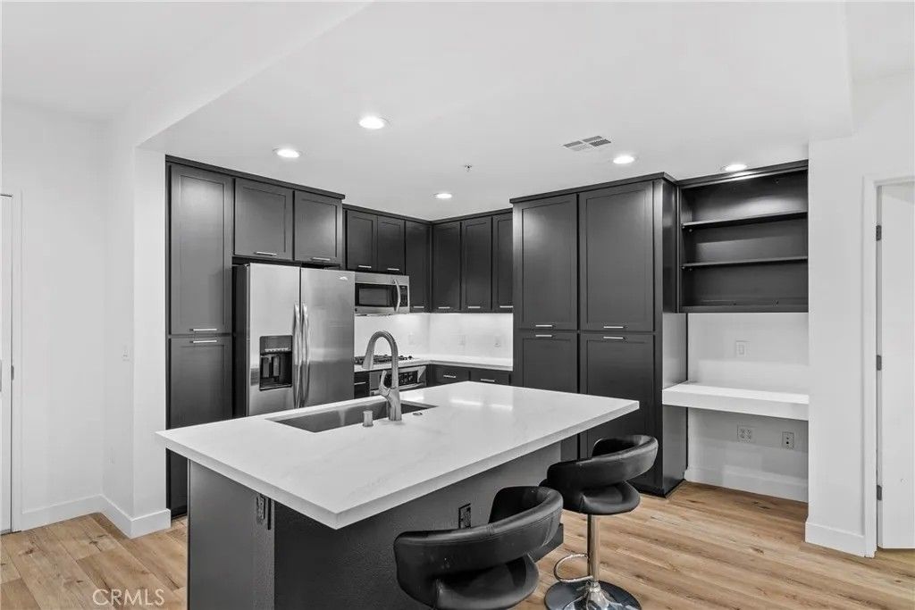 Photo of 21301 Erwin #206, Woodland Hills, CA 91367 (MLS # SR26013349)