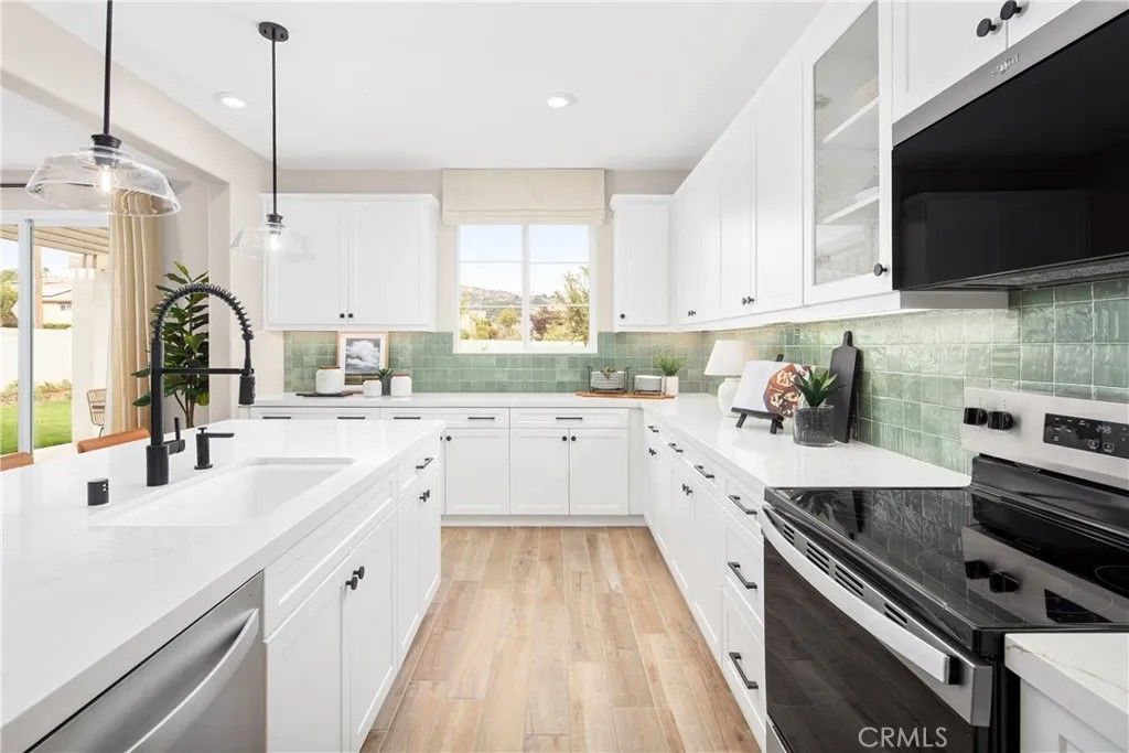 Photo of 2096 Woolem Place, Escondido, CA 92026 (MLS # OC25248991)