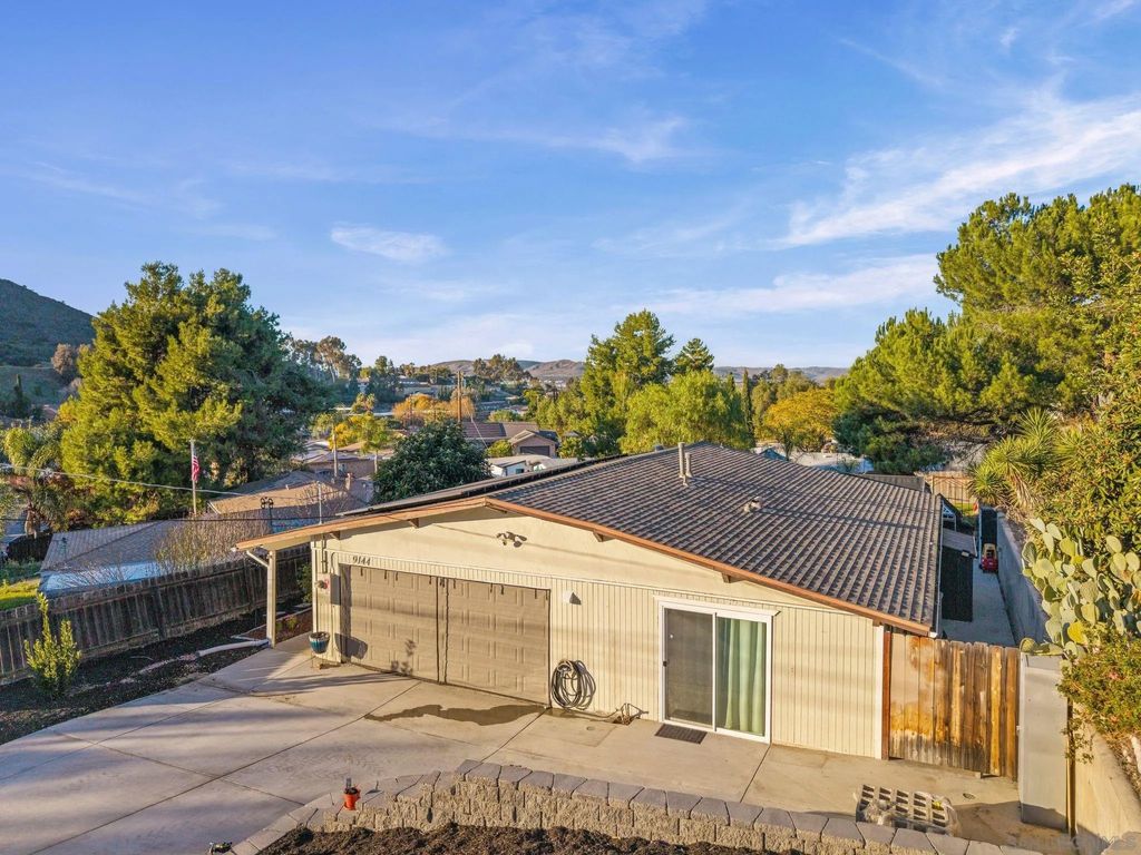 Photo of 9144 Fanita Rancho Rd, Santee, CA 92071 (MLS # 250045678)
