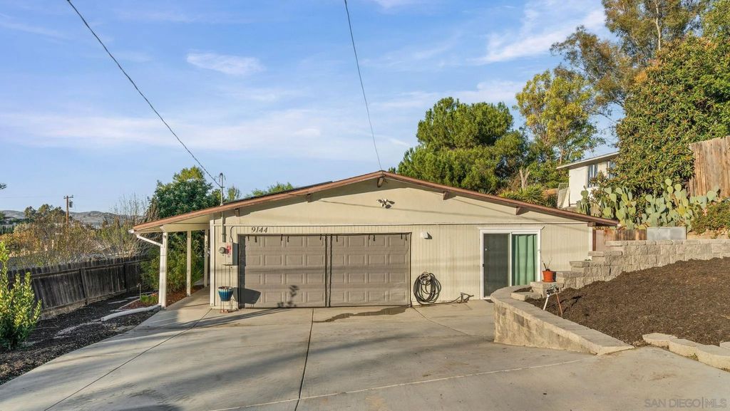 Photo of 9144 Fanita Rancho Rd, Santee, CA 92071 (MLS # 250045678)