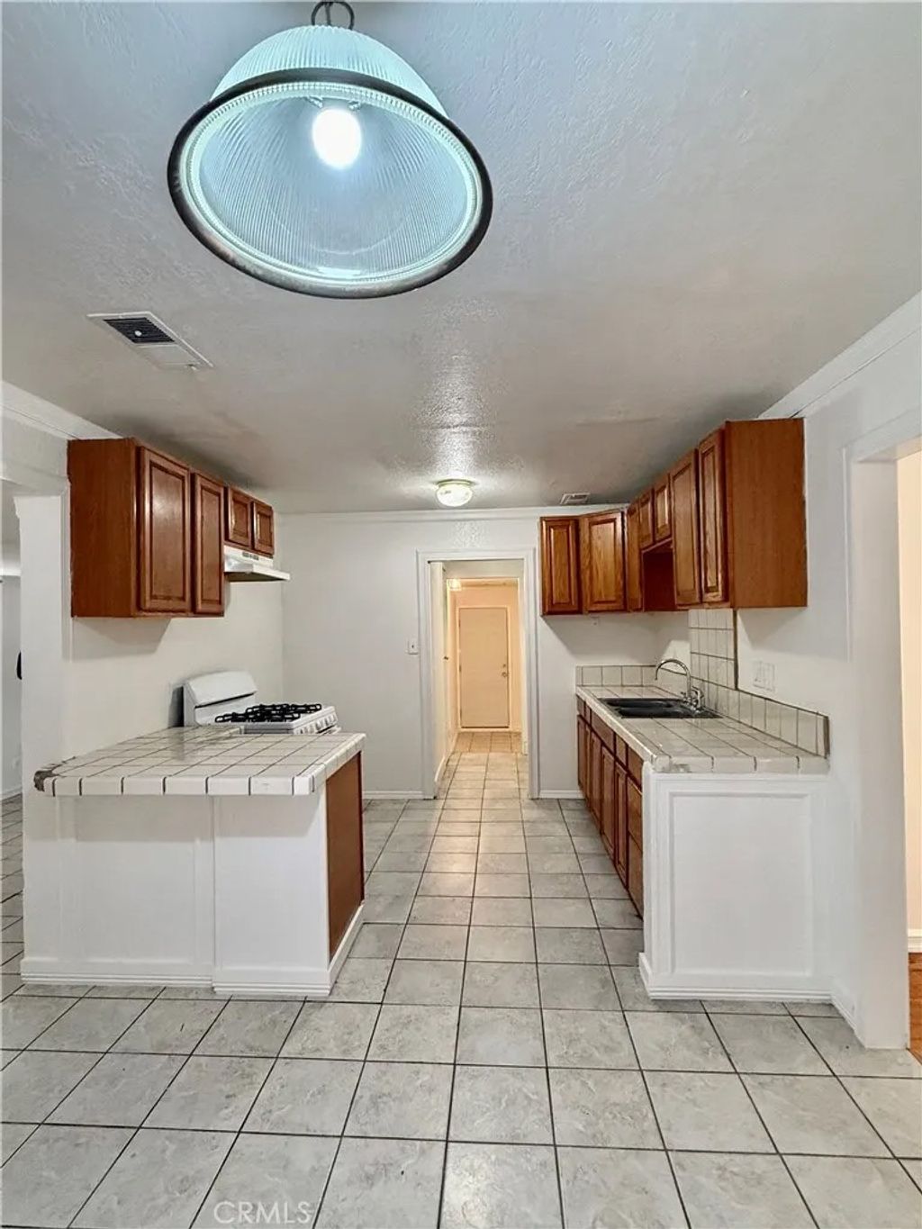 Photo of 1020 W 24th St, Merced, CA 95340 (MLS # MC26094848)