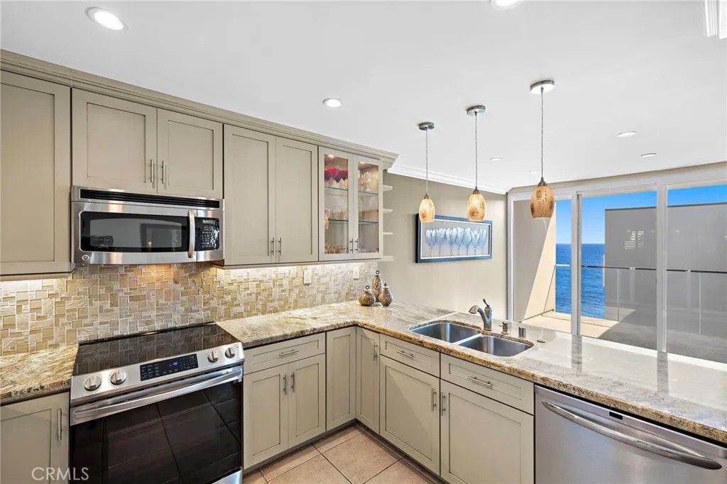 Photo of 1585 S Coast Hwy #65, Laguna Beach, CA 92651 (MLS # LG26011449)