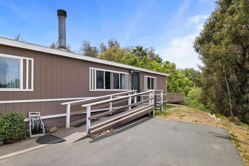 Photo of 9156 Winter Gardens Blvd, Lakeside, CA 92040 (MLS # 260009505)