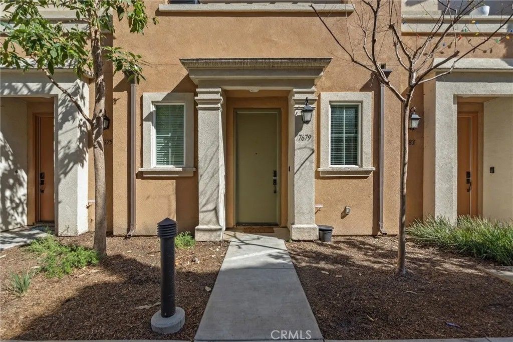 Photo of 7679 Sunflower Dr, Pico Rivera, CA 90660 (MLS # DW26059838)