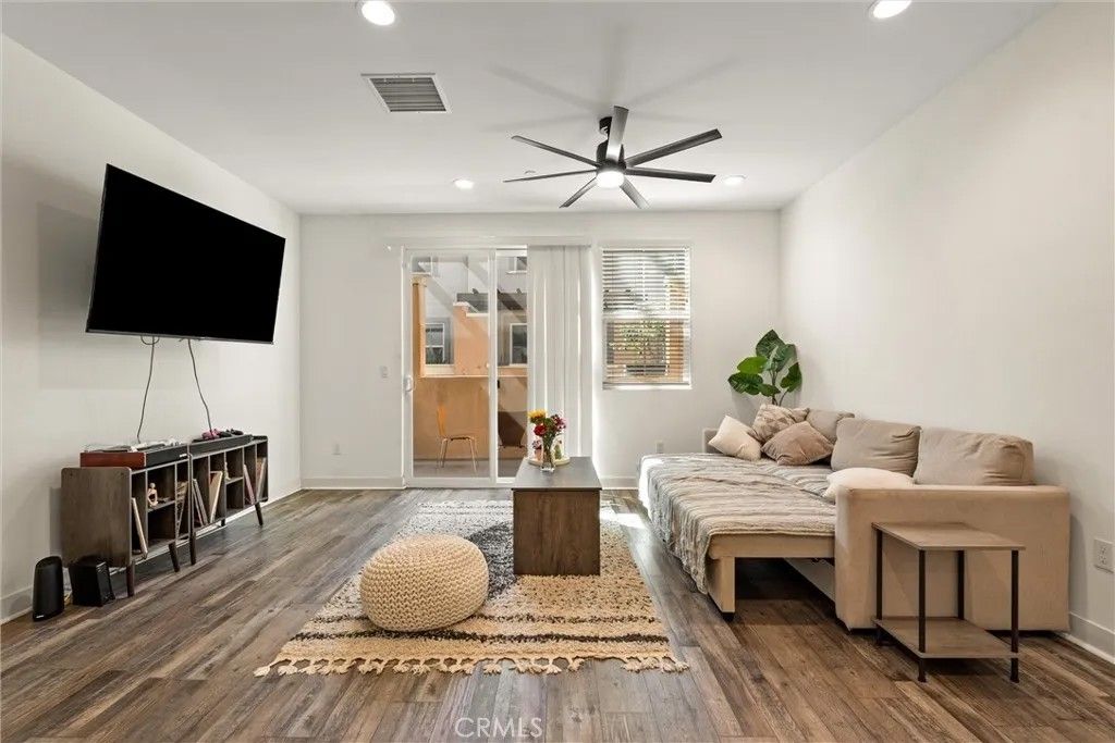 Photo of 7679 Sunflower Dr, Pico Rivera, CA 90660 (MLS # DW26059838)