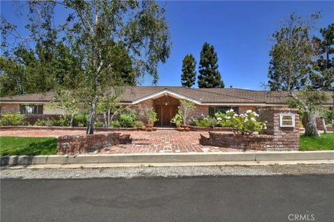 Photo of 16172 Royal Oak Road, Los Angeles, CA 91436 (MLS # SR26195984)