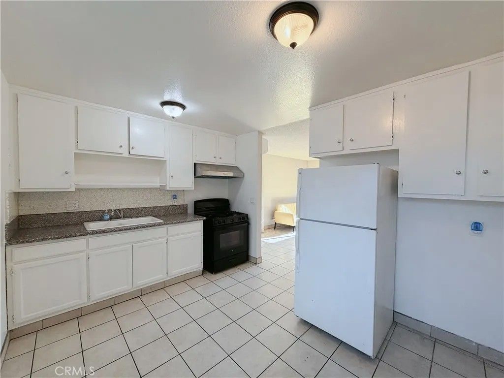 Photo of 621 Leonard Ave, Los Angeles, CA 90022 (MLS # TR25270805)