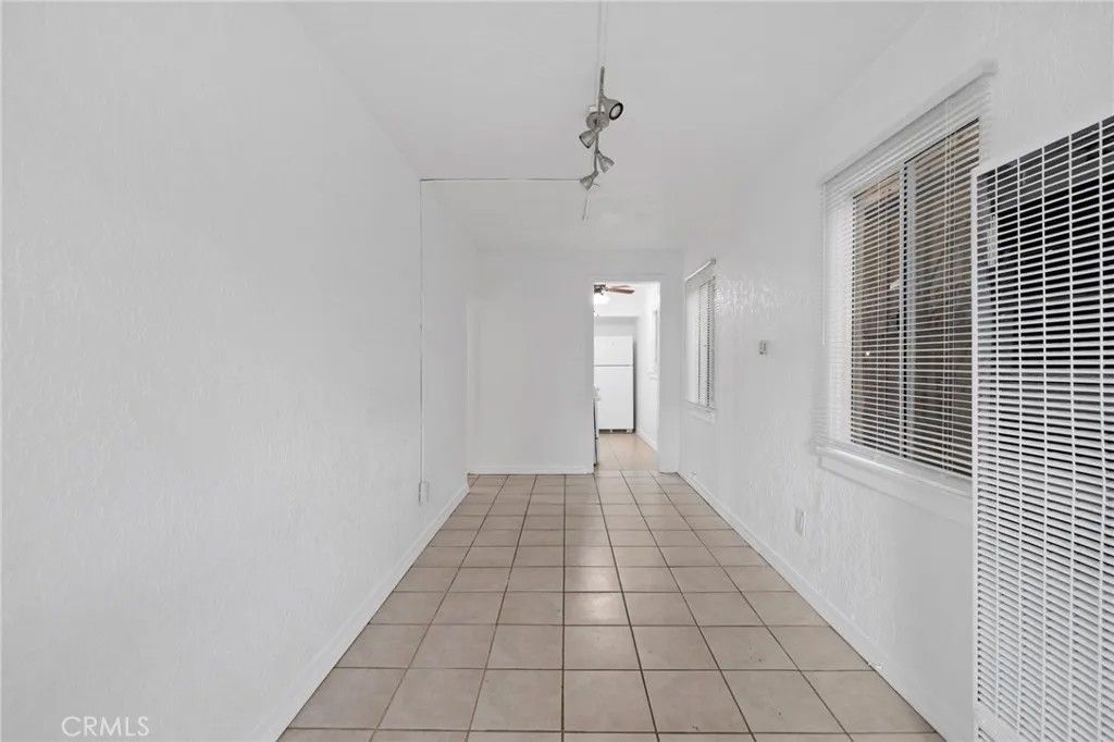 Photo of 1285 South Dunsmuir Ave, Los Angeles, CA 90019 (MLS # RS25267599)