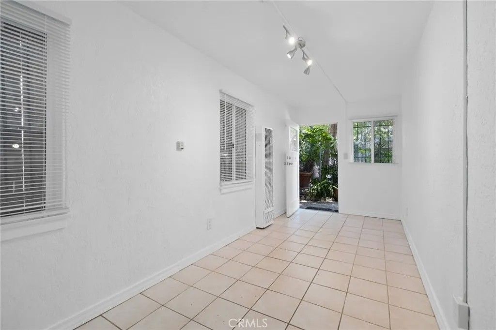 Photo of 1285 South Dunsmuir Ave, Los Angeles, CA 90019 (MLS # RS25267599)