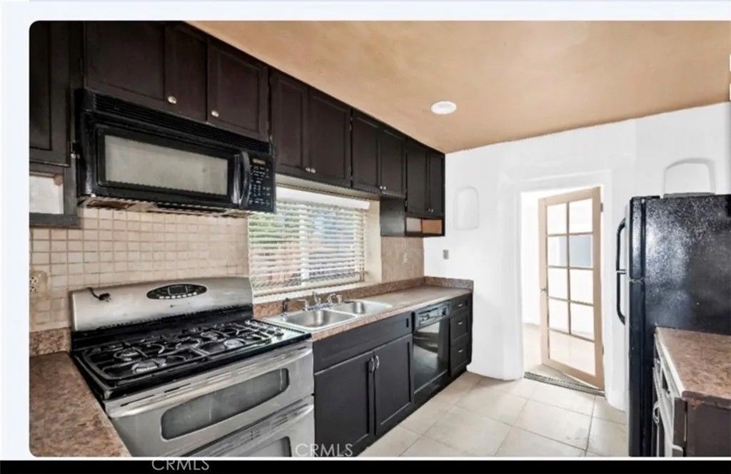 Photo of 82481 Valencia Ave, Indio, CA 92201 (MLS # SR26095449)