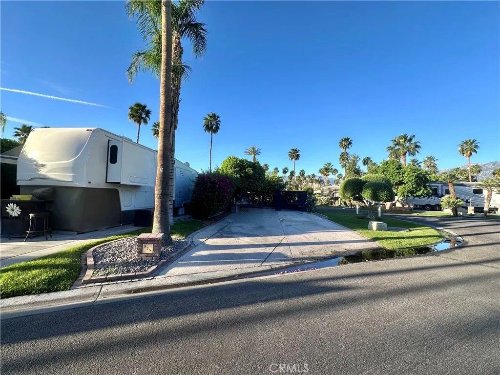 Photo of 69411 Ramon Rd, Cathedral City, CA 92234 (MLS # CV26062712)