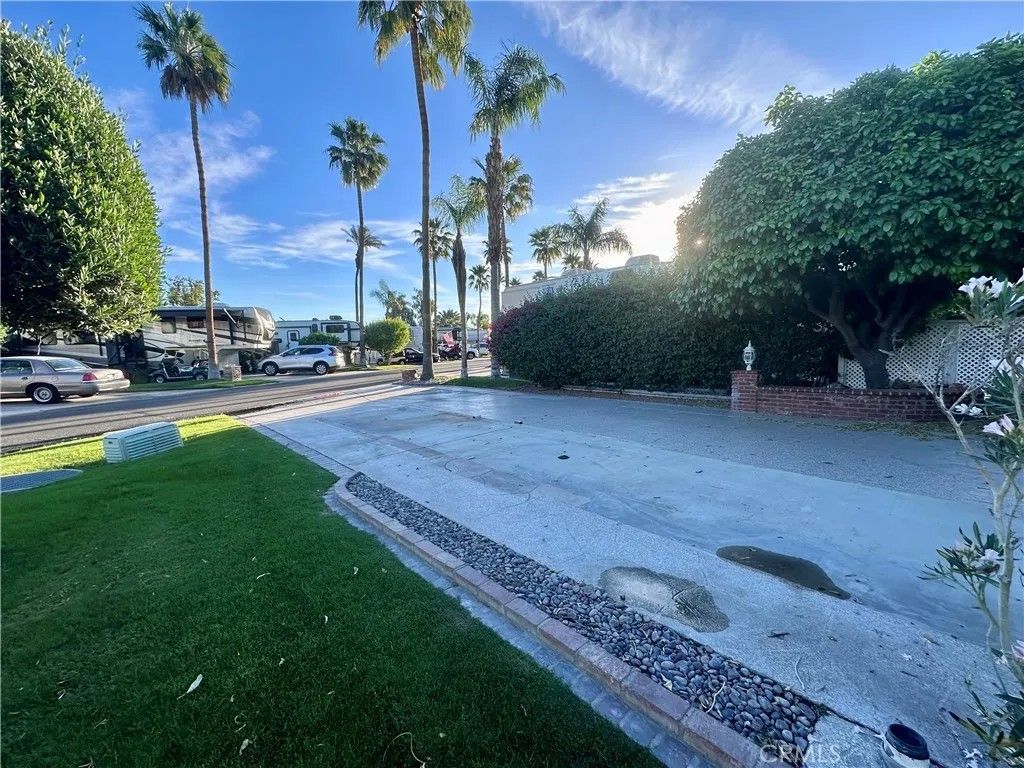 Photo of 69411 Ramon Rd, Cathedral City, CA 92234 (MLS # CV26062712)