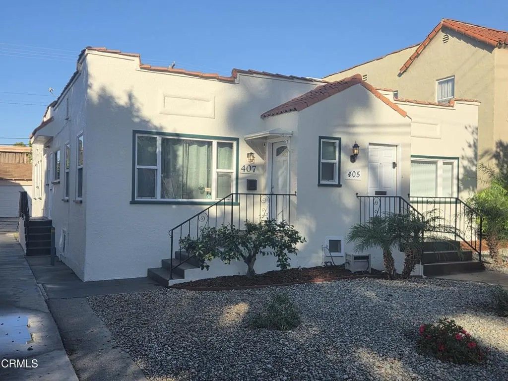 Photo of 407 S Verdugo Road, Glendale, CA 91205 (MLS # P1-24568)