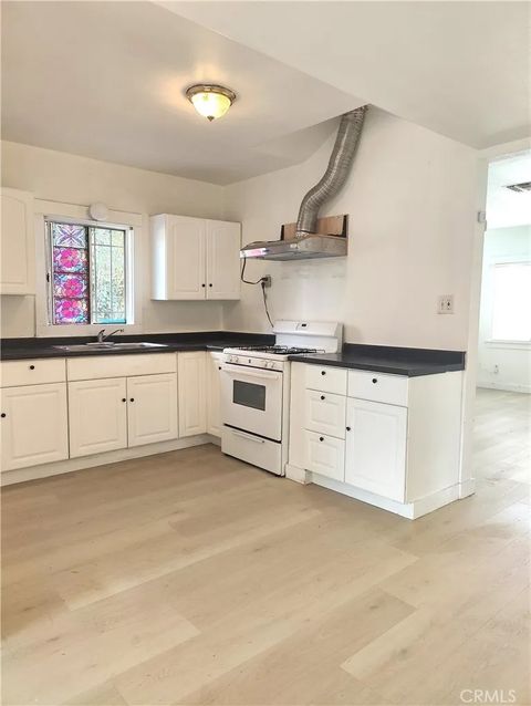 Tiny photo for 565 W 9th St, Pomona, CA 91766 (MLS # WS25232848)