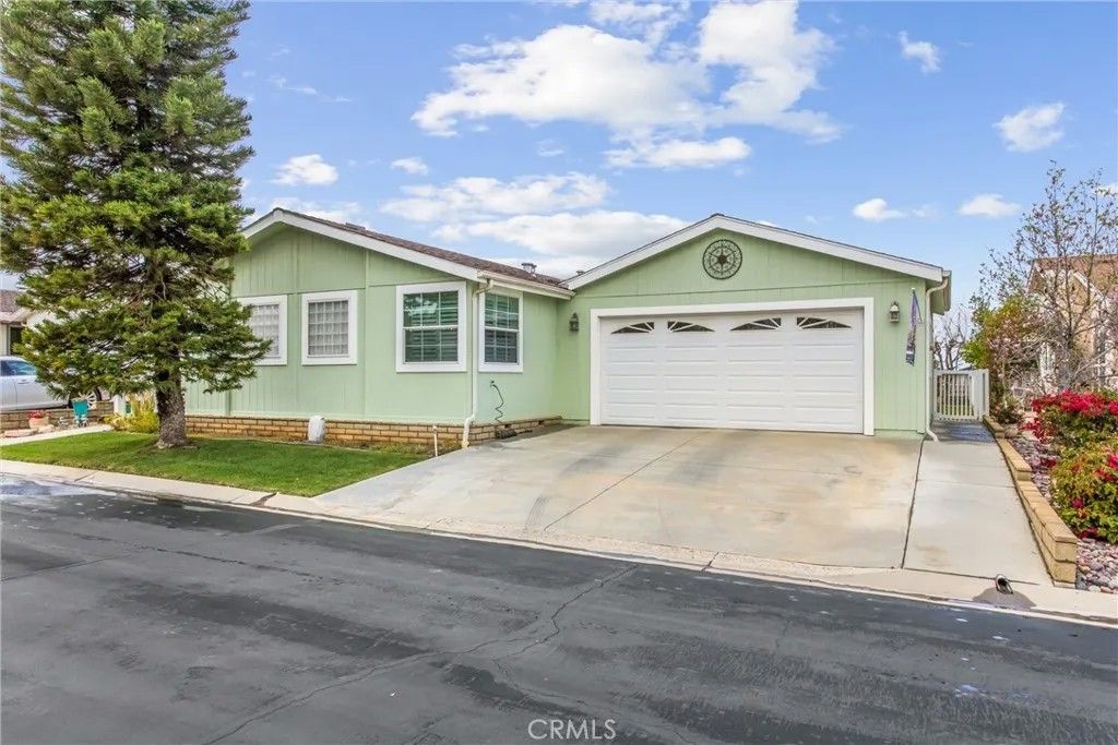 Photo of 10961 Desert Lawn, 464 (Plum) Dr, Calimesa, CA 92320 (MLS # IG26036216)