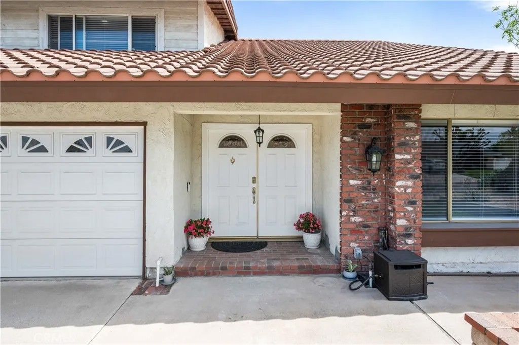 Photo of 6832 Ranchgrove Rd, Riverside, CA 92506 (MLS # PW26090833)