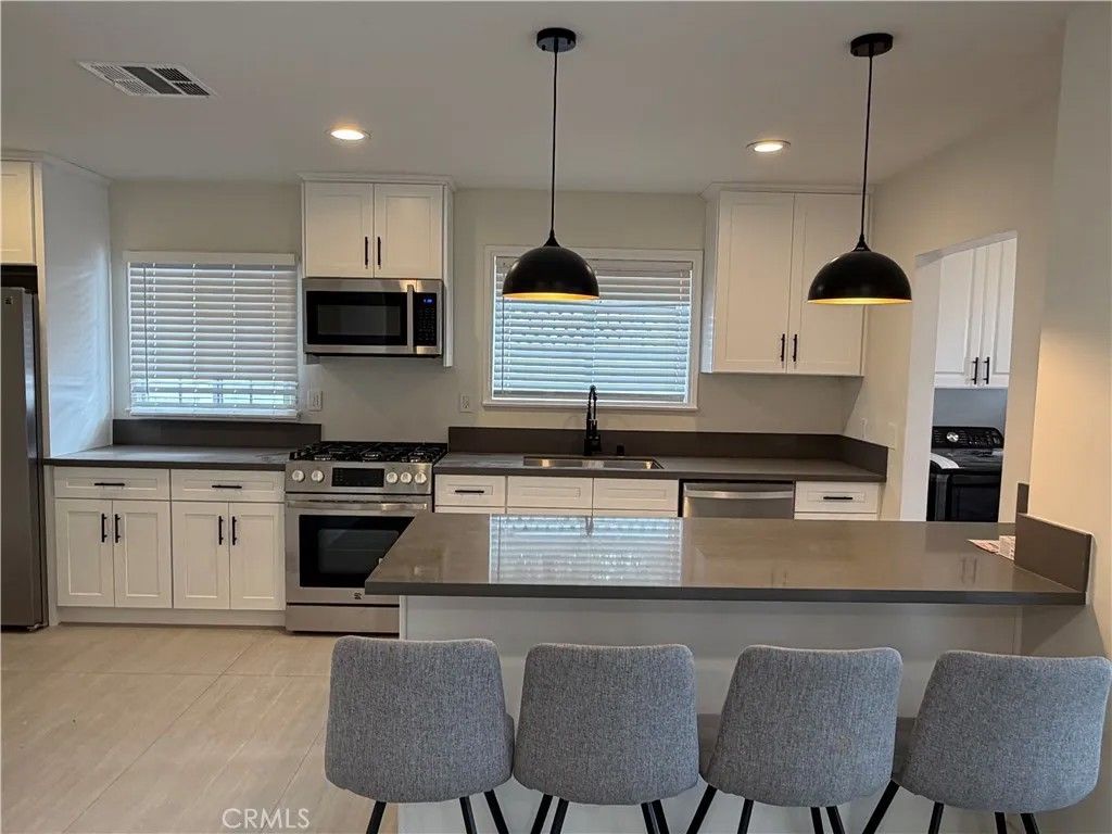 Photo of 19216 Calvert Street, Tarzana, CA 91335 (MLS # SR26008014)