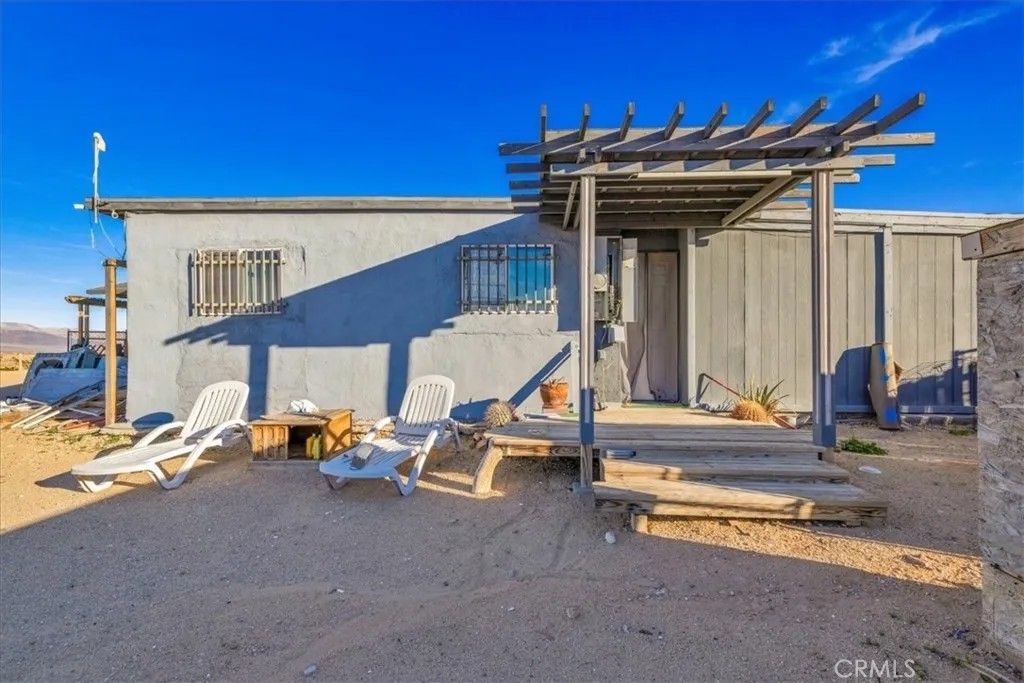 Photo of 5048 Godwin Rd, 29 Palms, CA 92277 (MLS # JT25278404)