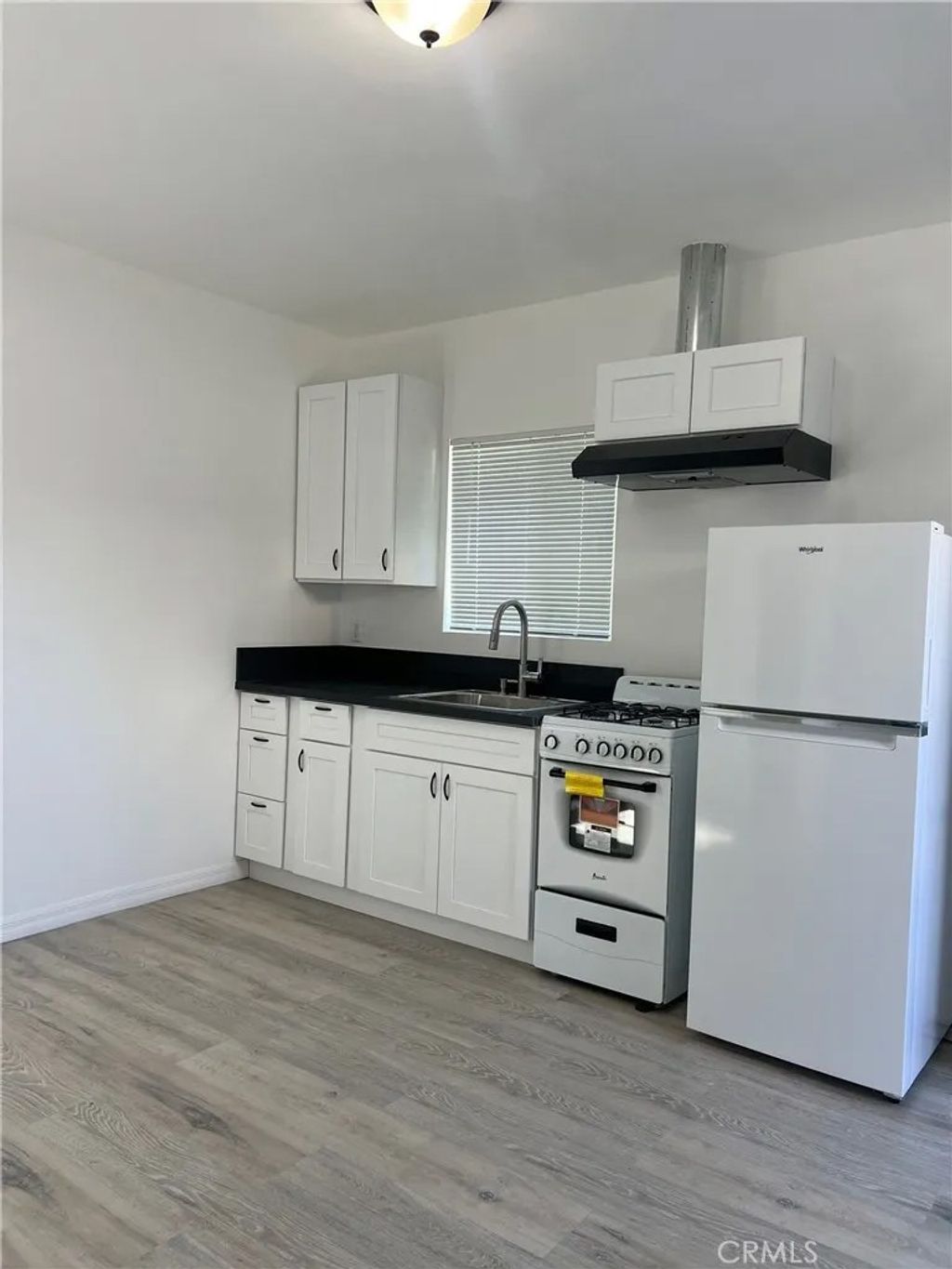 Photo of 18740 Valerio St, Reseda, CA 91335 (MLS # SR25273012)