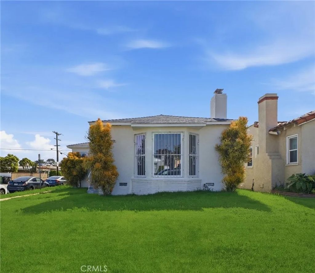Photo of 8802 S Wilton Place, Los Angeles, CA 90047 (MLS # IN26087326)