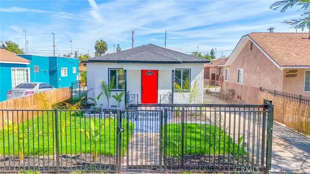 Photo of 8932 Orchard Ave, Los Angeles, CA 90044 (MLS # DW26046539)