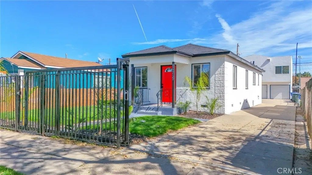 Photo of 8932 Orchard Ave, Los Angeles, CA 90044 (MLS # DW26046539)