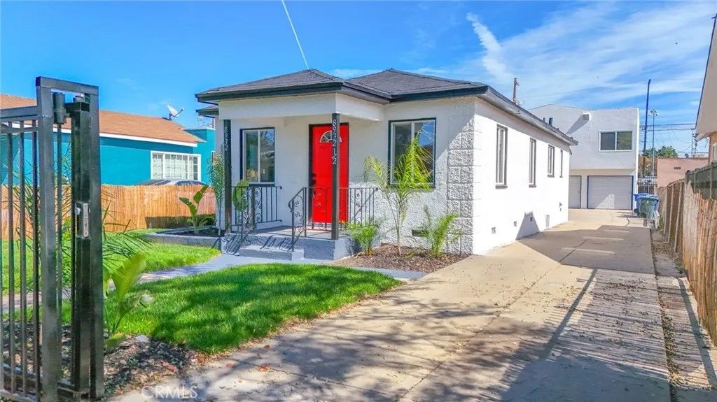 Photo of 8932 Orchard Ave, Los Angeles, CA 90044 (MLS # DW26046539)