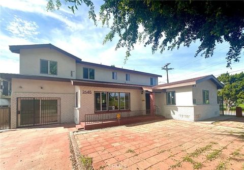Photo of 2645 W Via Corona, Montebello, CA 90640 (MLS # PW26040786)