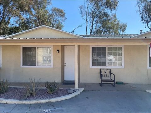Photo of 19216 Kendell Dr, Devore, CA 92407 (MLS # IG26051379)