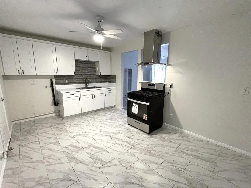 Photo of 6959 N Atlantic Pl, Long Beach, CA 90805 (MLS # PW25280453)