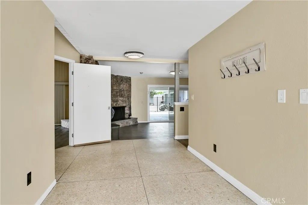 Photo of 2550 W Rowland Avenue, Anaheim, CA 92804 (MLS # PW26036104)