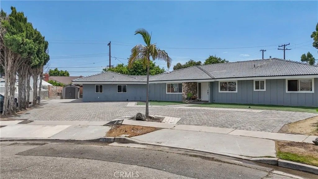 Photo of 2550 W Rowland Avenue, Anaheim, CA 92804 (MLS # PW26036104)