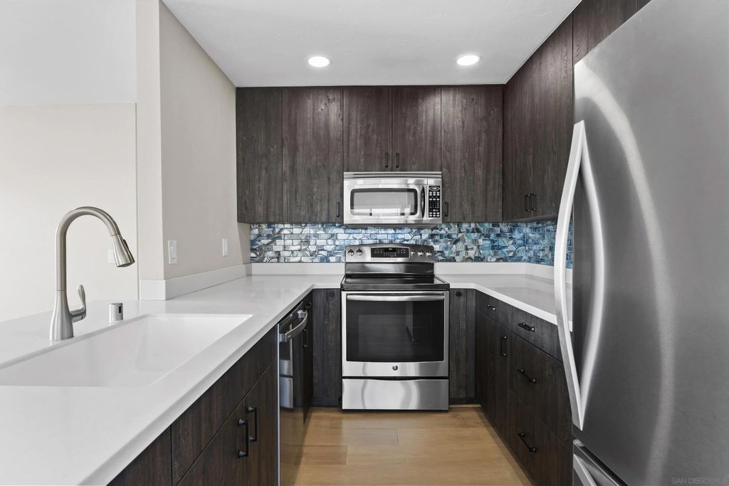 Photo of 7702 Caminito Tingo #H201, Carlsbad, CA 92009 (MLS # 260003342)